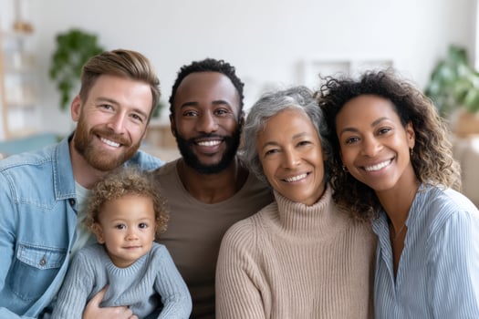 Happy mixed-race family sharing joy at home while exploring dynamics of diverse family structures photo