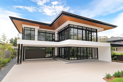 Modern house with large garage and large windows photo