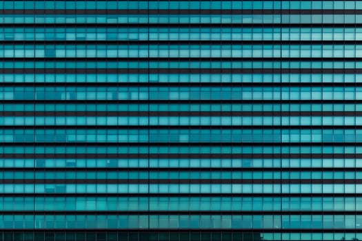 A blue building with many windows photo
