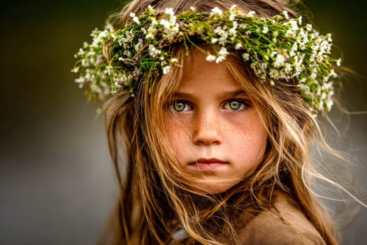 Young girl with flower crown and freckles portrait photo