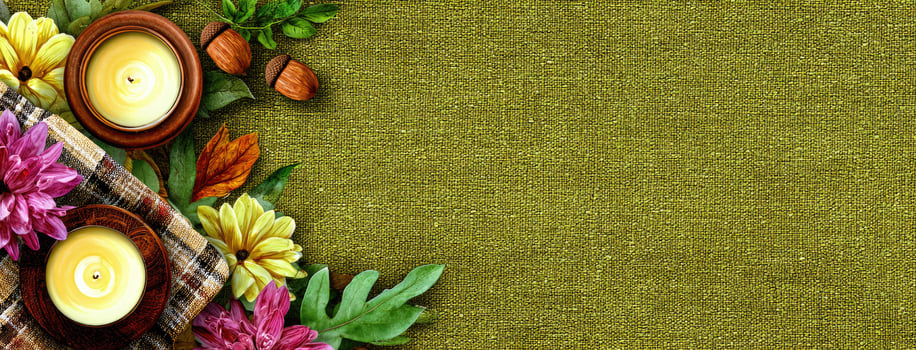 A green cloth with flowers and candles photo