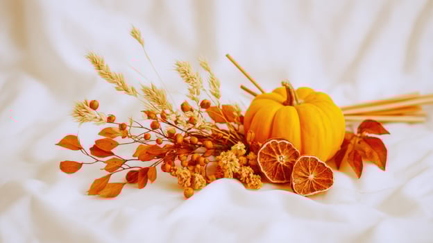 Autumn still life with orange pumpkin and dried fruits photo