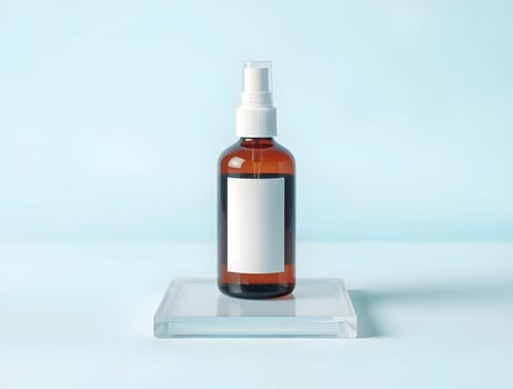 A bottle of essential oil on a clear stand photo