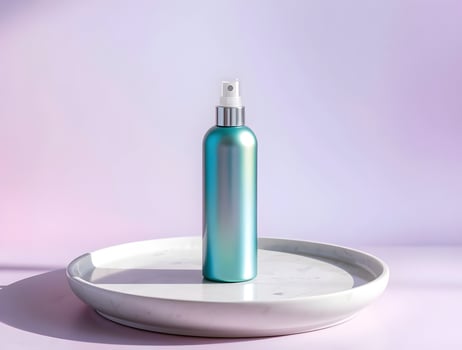 A blue bottle of spray on a white plate photo