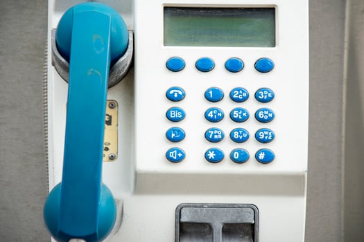 Retro style payphone with buttons and a digital screen. photo