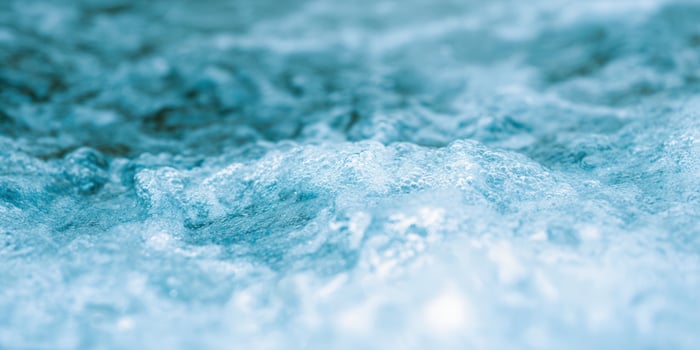 This image captures the essence of water in motion, featuring its texture and clarity. photo