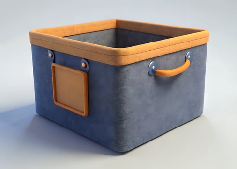 Blue Fabric Storage Basket with Orange Handles on Beige Background photo