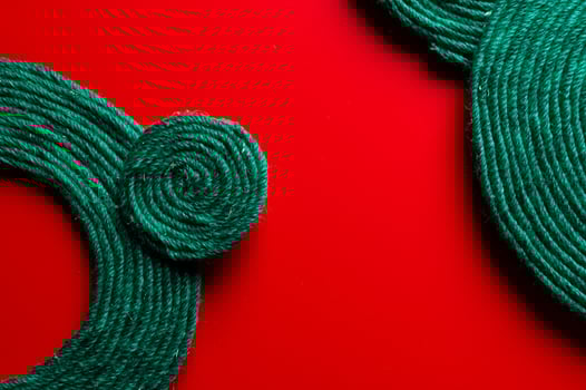 Abstract background of threads woven in a circle, on a bright background. Natural materials as a concept of handcraft photo