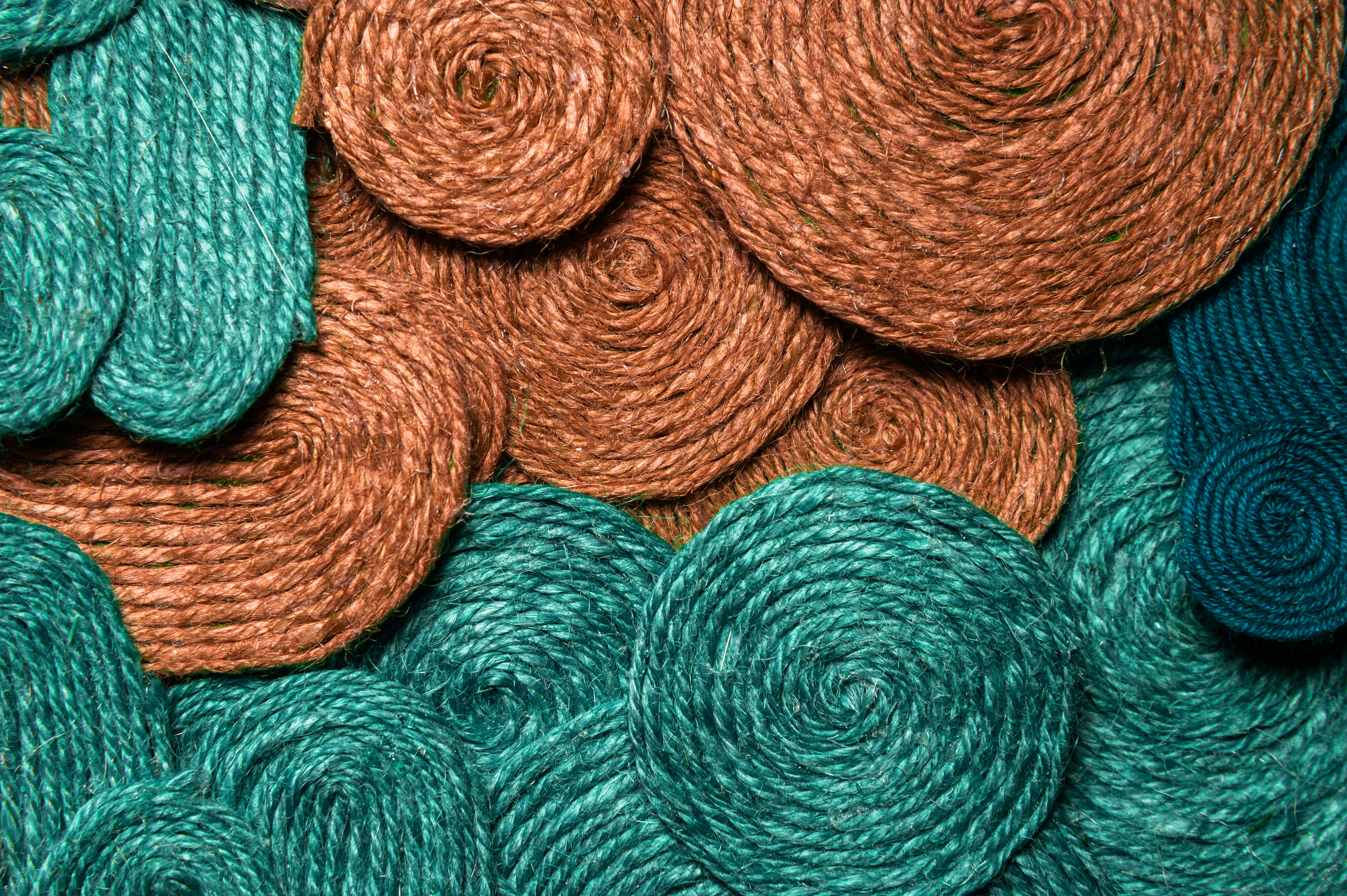Background of different colors of textures of threads connected together. Abstract textile background photo