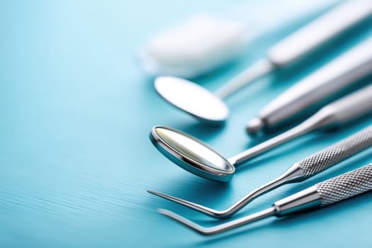 Close-up view of dental tools amid a vibrant clinical background for treating cavities and sensitivity photo