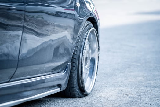 A close up of a car tire with a tire tread photo