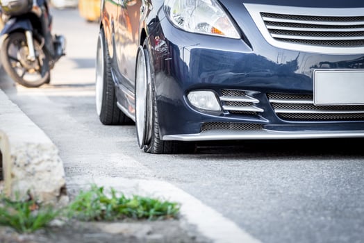 A car is parked on the side of the road photo