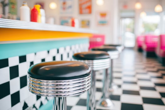 Retro chrome stools inviting customers at vintage coffee shop counter photo