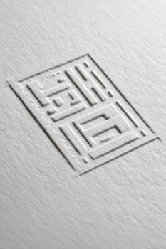 White-on-White Embossed Background with Modernist Design photo