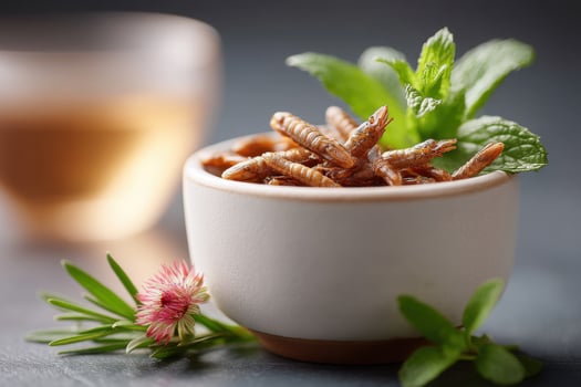 Seasoned locusts served in a bowl with garnishes, perfect for adventurous snack lovers and food explorers photo