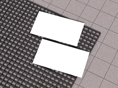 White business cards placed on a concrete grid pattern surface. photo
