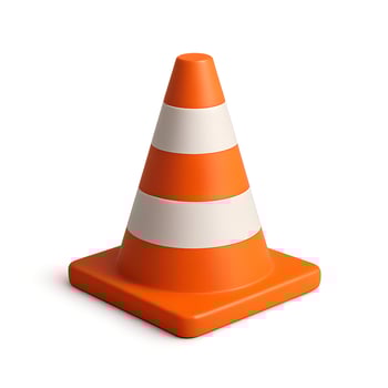 A traffic cone is shown on a white background photo