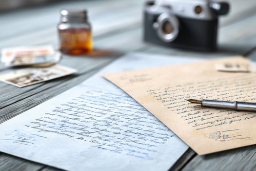 Exploring secrets and omission through anonymous letters in a quiet, reflective environment photo