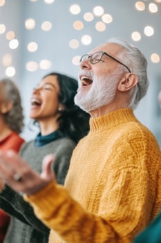 Joyful elderly individuals singing karaoke together at a community gathering photo