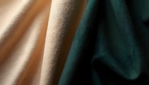 Close-up of Two Woven Fabric Swatches in Beige and Dark Green photo