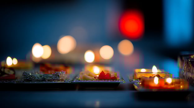 Warm Glow of Celebration Festive Candlelit Appetizers on Display. photo