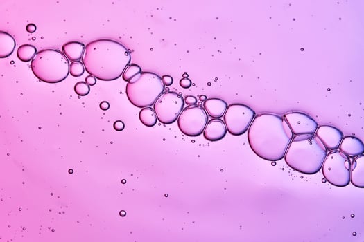 The texture is serums with spicules on a purple lilac background. photo