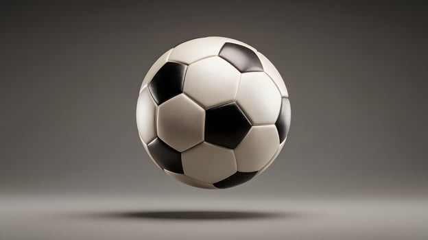 Soccer Ball Floating in Midair on Gray Background photo
