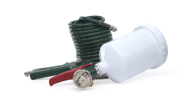 Air Tool Kit with Coiled Hose and Spray Nozzle on White Background photo