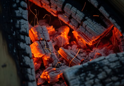 Glowing Campfire Embers and Charcoal Texture photo