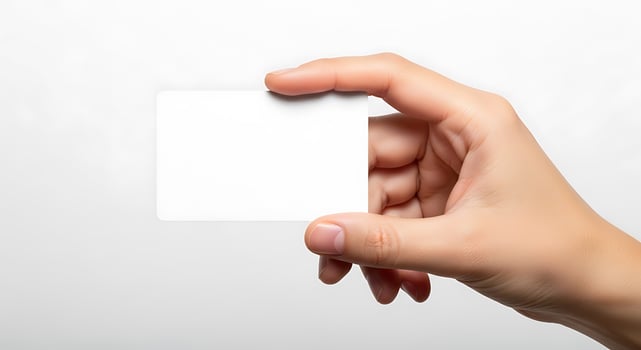 Hand Holding Blank Card on White Background photo