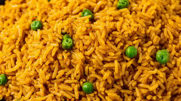 Delicious Golden Rice with Bright Green Peas, A Close Up Feast. photo
