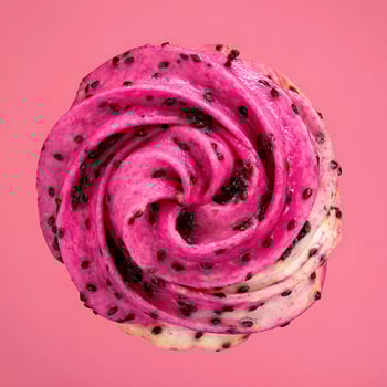 Vibrant Pink Dragon Fruit Swirl with Black Seeds Detailed Close Up. photo