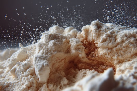 A pile of white powder on a table photo