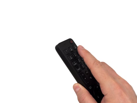 White male hand on white background presses buttons on TV remote control TV channels remote control for banners for TV advertising Copy space, flay lay, top view. photo