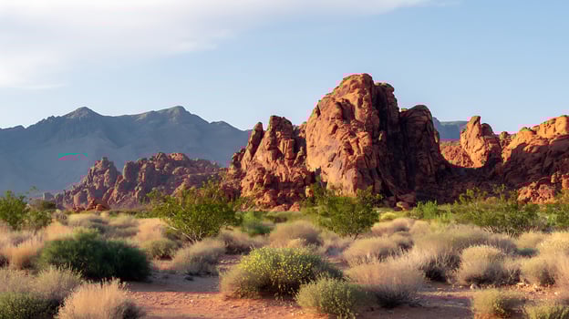 Majestic Red Rock Formations Under a Vast Blue Sky. photo