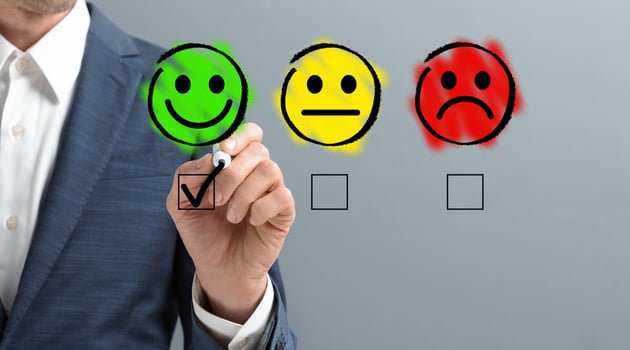 Customer Experience Concept. Happy Businessman ticking off on Excellent Smiley Face, gray background, panorama, copy space photo