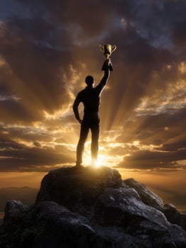 Person holding trophy at sunset photo