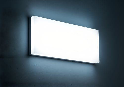 Rectangular Wall Light Fixture Illuminating a Textured Surface for Logo Mockup 1 photo