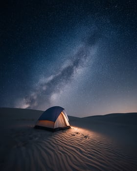 Sunlit Desert with a Vast Horizon and Clear Blue Sky Filled with Light photo