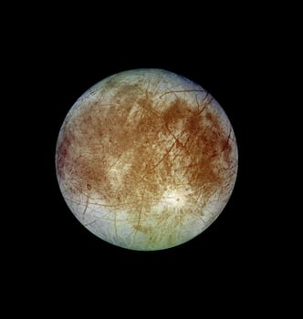 Detailed view of Europa, Jupiter's enigmatic icy moon, showcasing its fractured surface in deep space. photo