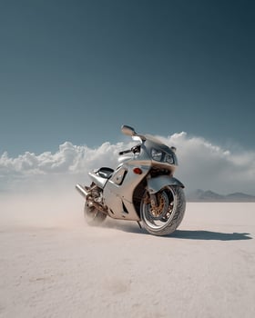 Sleek Silver Motorbike Moving Over Open White Salt Desert With Dust Cloud and Strong Blue Sky in Minimalist Adventure Frame photo