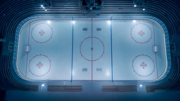 Hockey empty rink for playing hockey, ice with scratches from skates, empty stands photo