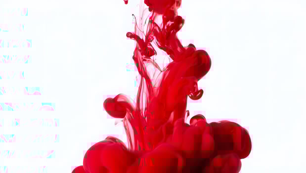 Red Ink in Water Abstract Background Isolated on White photo