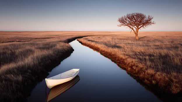 Solitary Rowboat on Calm Waters Beside Dry Grass Fields and Tree. photo