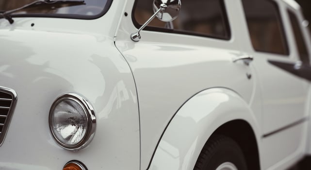 Gleaming White Classic Car Beautifully Restored Shows Off Retro Design photo