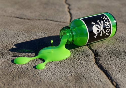 Spilled Poison Bottle with Neon Liquid on Stone Surface photo