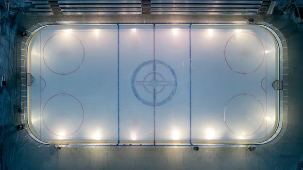Aerial view of a miniature hockey rink with goals and markings photo