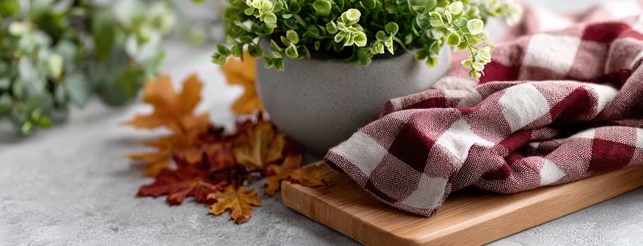 A wooden cutting board with a red and white checkered cloth photo