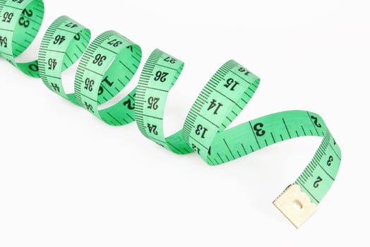 Measuring tape on white photo