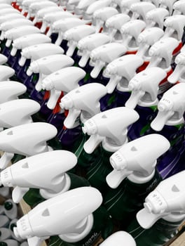 Spray bottles background, close up photo